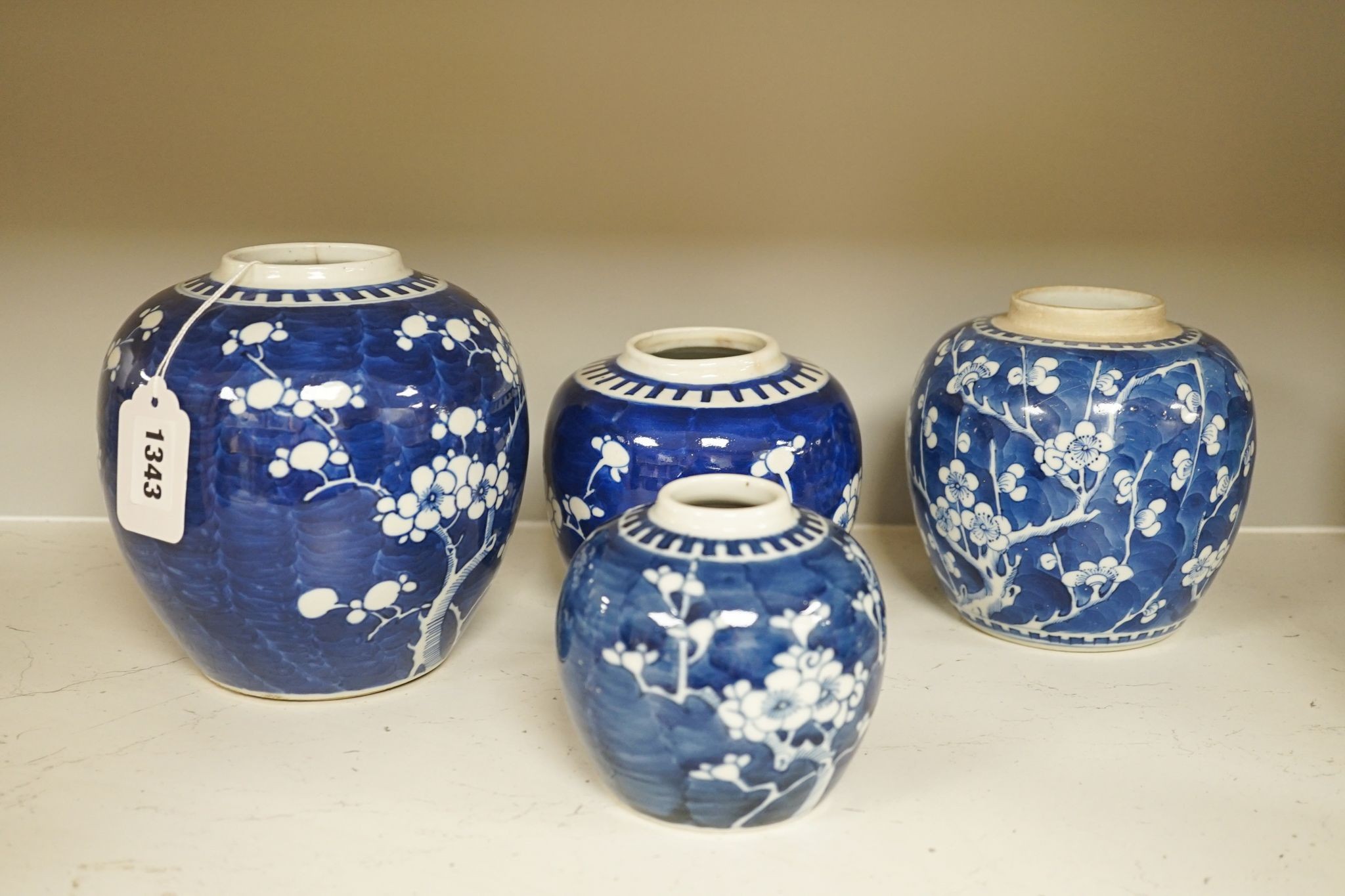 Eight various Chinese blue and white ‘prunus’ jars, largest 16 cm high